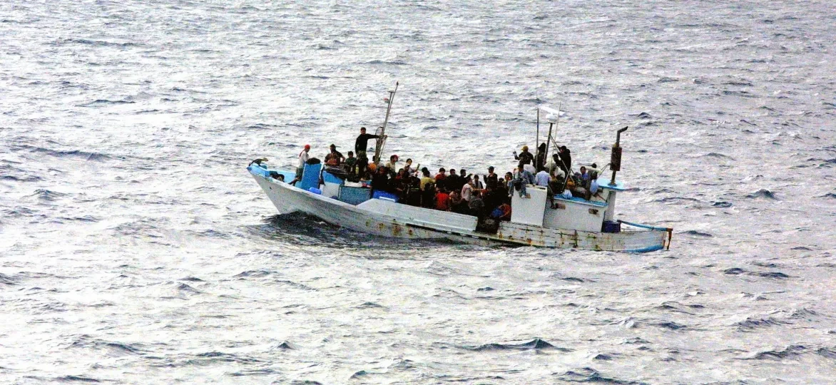 Vluchtelingen op een boot