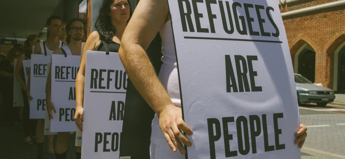 Sign reading 'Refugees are people'