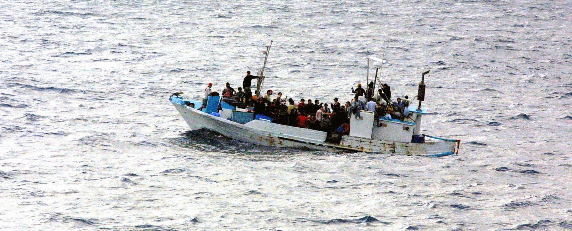 Vluchtelingen op een boot