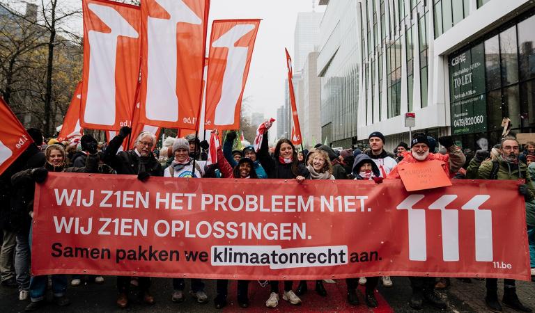 11.11.11 op de klimaatmars in Brussel, met spandoek