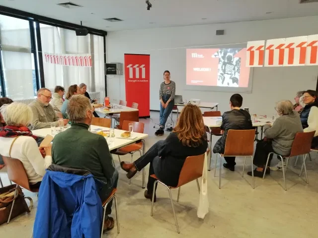 Hasselt_groep_Eva_vlagjes