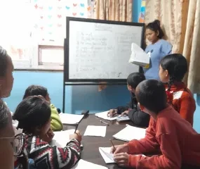 met en van elkaar leren. Stimulerend. De schoolresultaten verbeterden. 