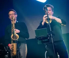 The brass section of the orchestra at United for Palestine
