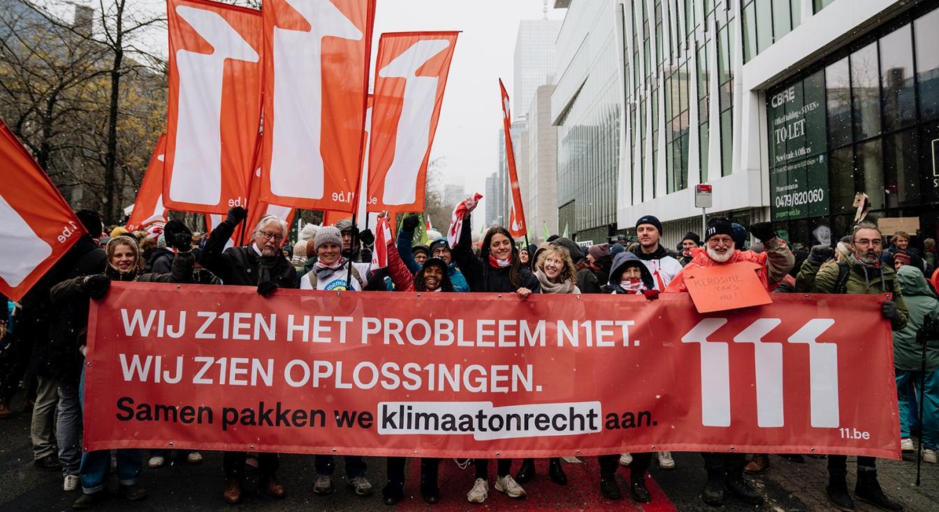 11.11.11 op de klimaatmars in Brussel, met spandoek