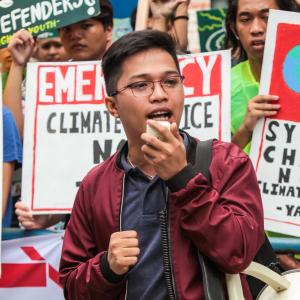 Jake Tabara tijdens een klimaatactie aan de universiteit van Diliman