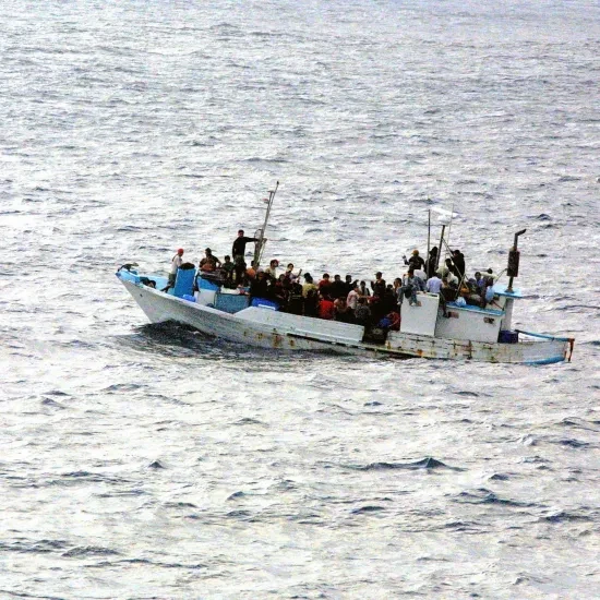 Vluchtelingen op een boot
