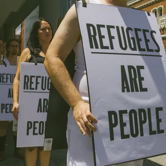 Sign reading 'Refugees are people'