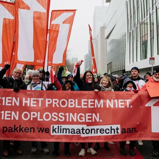 11.11.11 op de klimaatmars in Brussel, met spandoek